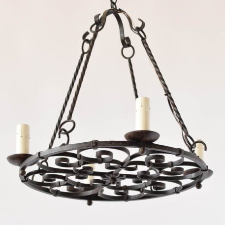 Simple Flat Iron chandelier with scrolled interior