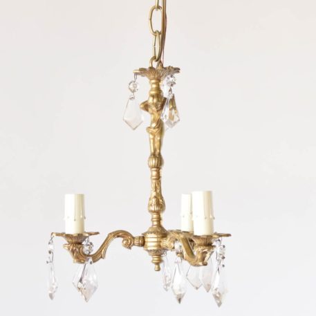 Pair of Vintage Bronze French Chandelier with Crystals Accented by Cherub Column