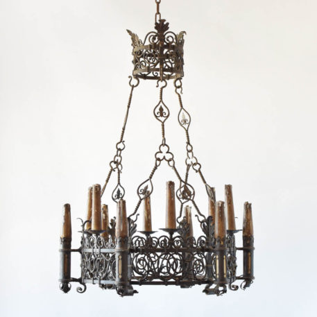 Antique French chandelier with hand forged scrolls in the art nouveau form