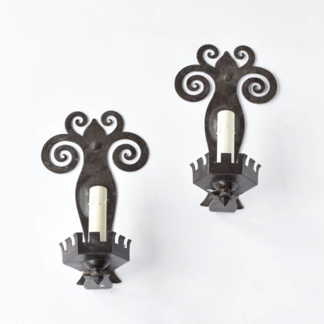 Antique sconces from Belgium with hammered back plates