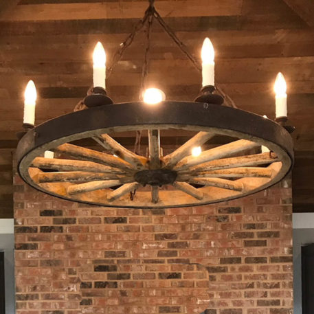 Antique Carriage or Wagon Wheel converted into rustic chandelier