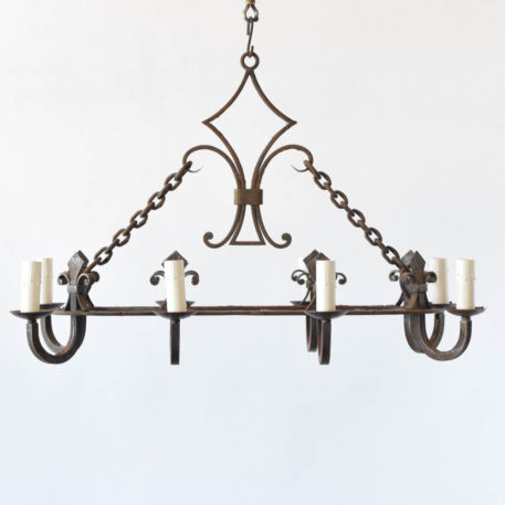 8 light oval chandelier with decorative collector and Florida lee design from France.