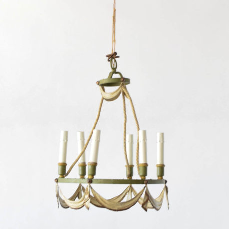 6 light iron toile chandelier from France. The chandelier is painted along with a swag design.