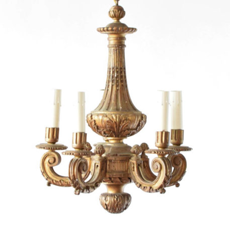 5 light gilded Italian chandelier madeof wood with one central column.