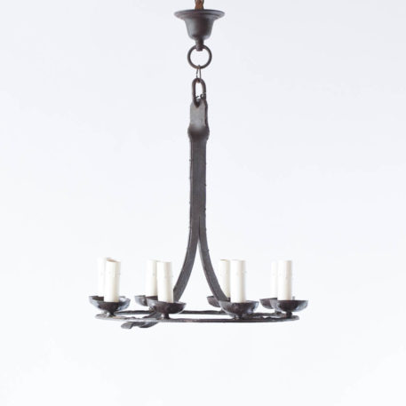 Rustic Belgian chandelier with 8 lights and textured metal.