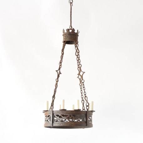 Early 1900s French chandelier with hand forged iron rings holding a pierced band of iron