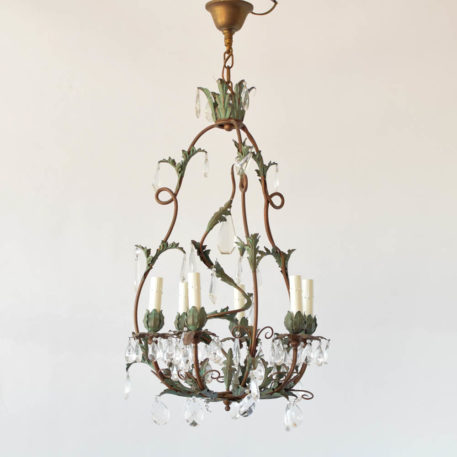Vintage French chandelier made from iron with leaves and crystal decorations