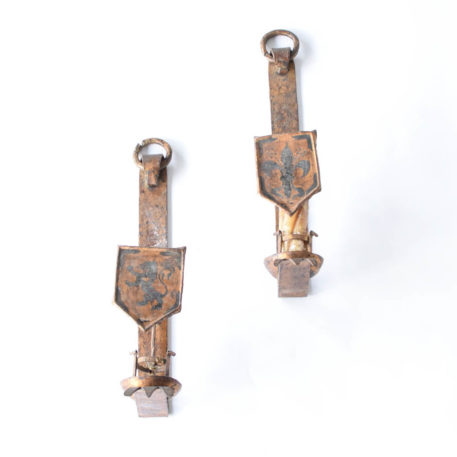 Pair of gold iron sconces with shields