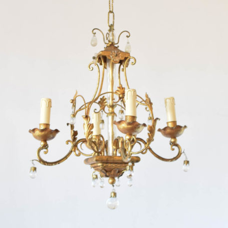 Vintage Spanish chandelier with glass column and gilded frame decorated with simple glass beads