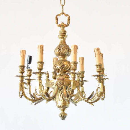 Heavy casted bronze chandelier from France with nicely casted bronze column, arms, and wreath details