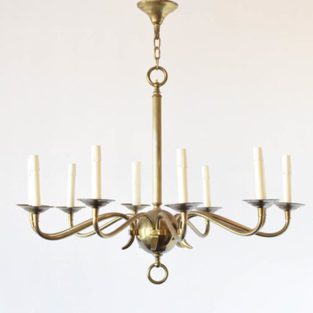 Simple vintage brass chandelier with central brass ball and eight brass arms in four groups