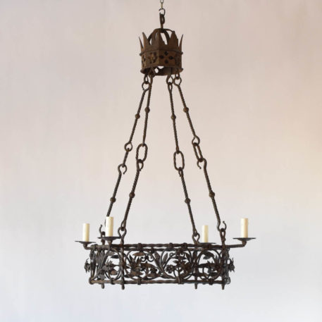 Antique French chandelier with tall rods, nice crown and hand forged leaves throught central band