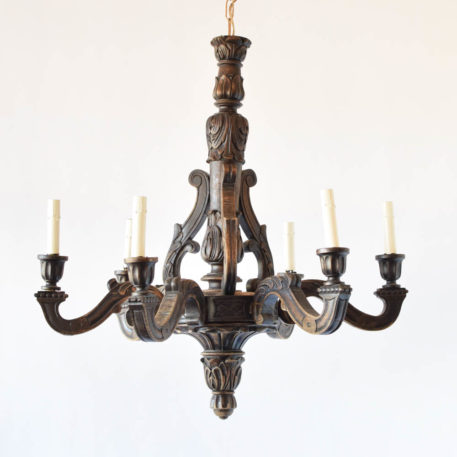 Vintage wood chandelier from Belgium with carved central column and large carved finial