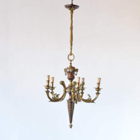 Wood and Bronze Empire chandelier with rams head decorations and tall bronze column
