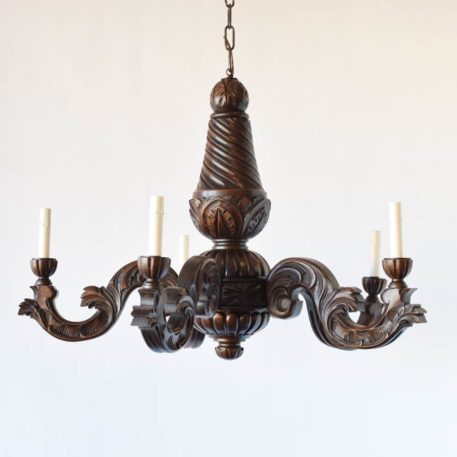 Large vintage wood chandelier from Belgium with thick central column carved with a twist and acanthus leaves above a carved wooden ball