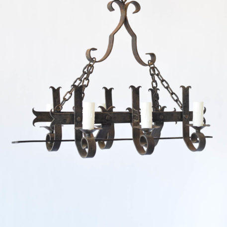 French chandelier made of long forged iron fleur de lis