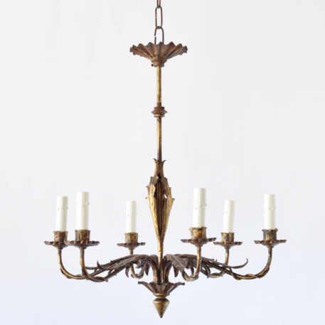 Vintage Spanish chandelier with thin column and leaves under the simple arms