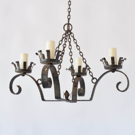 Vintage iron chandelier from belgium with hammered iron arms and small iron flower in the middle