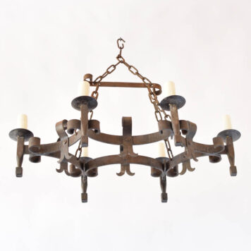 Vintage French chandelier with hand forged scalloped band and large iron curls