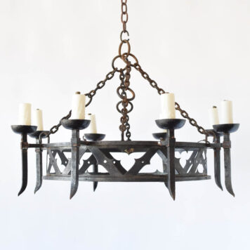 Mediterranean iron chandelier with perforated band and forged metal arms