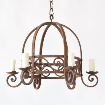 Antique French iron chandelier with rusty hand forged frame and dome form