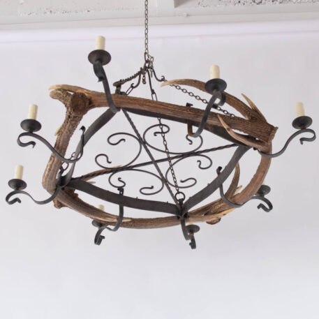 Vintage iron chandelier with red stag horns from Belgium
