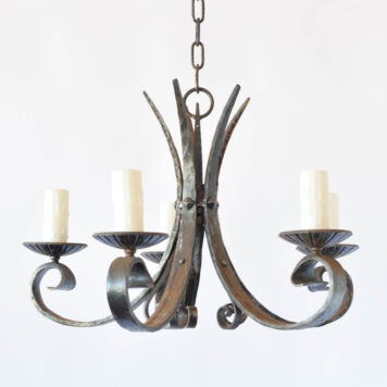 Iron chandelier from Belgium with hammered and tapered arms