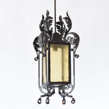French iron lantern with large leaves at the top