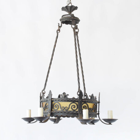 Antique French iron chandelier with forged rods and band and amber glass