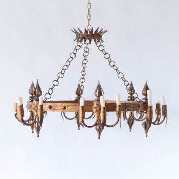 Large vintage Spanish chandelier with sun motifs on the band and crown form collector