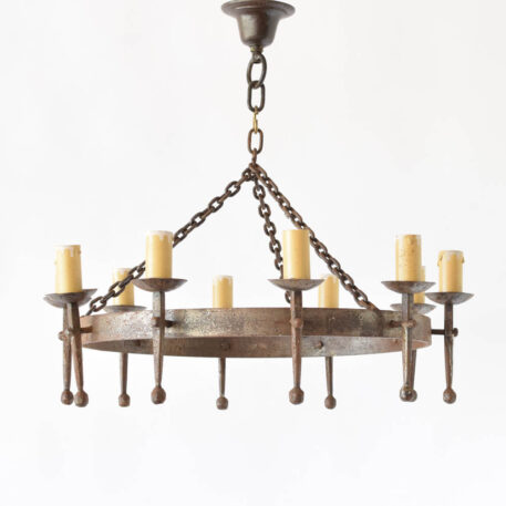 French iron chandelier with 10 arms on a simple rustic iron band
