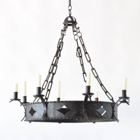 Large iron chandelier from Spain with rope twist on edge and diamond cut outs in the band
