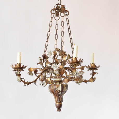 Vintage Italian iron and wood chandelier with stamped gilded iron leaves and painted flowers supported by a carved wooden urn