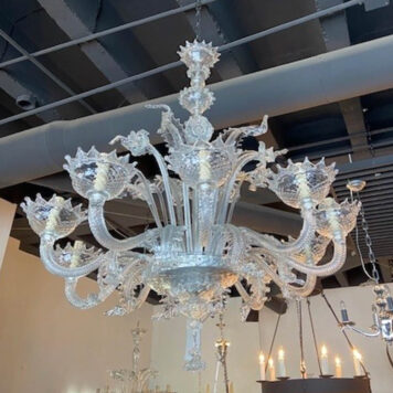 Italian Murano chandelier with 10 clear arms and column with leaves and flowers going up and down