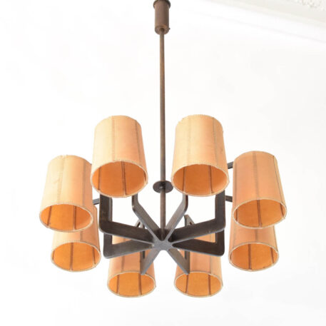 Iron chandelier with 8 angular arms supporting 8 vintage shades