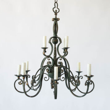 Flemish or French style pair of iron chandeliers with scroll arms and green color
