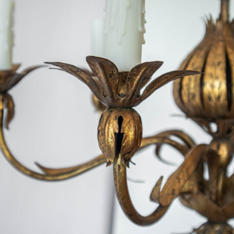 Gilded 6 light iron pomegranate shaped Spanish chandelier with leaves and a vintage gold finish with leafy candle cups