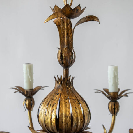 Gilded 6 light iron pomegranate shaped Spanish chandelier with leaves and a vintage gold finish with leafy candle cups and leaves on column