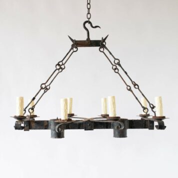 Elongated iron chandelier with 8 eight lights and 2 two down lights and hook chains