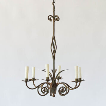 tall wrought iron chandelier with scrolls and leaves