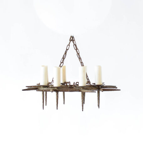 Eight light flat iron chandelier with spiky design