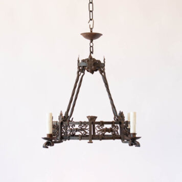 4 light iron cage chandelier with wrought iron details scroll work and rods and flowers iron details rusty