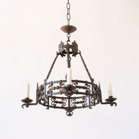4 light iron cage chandelier with wrought iron details scroll work and rods and flowers iron details rusty