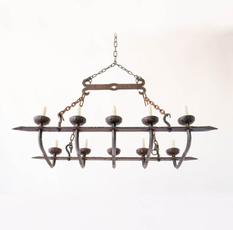 Elongated rusty iron chandelier with hooks heavy twisted wrought iron rustic simple