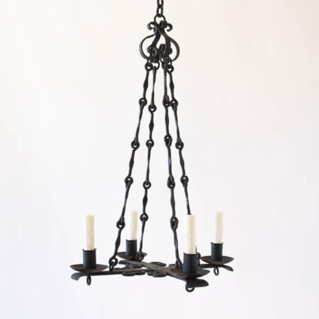 Flat iron 4 light chandelier with scrolls and hook chain and flower