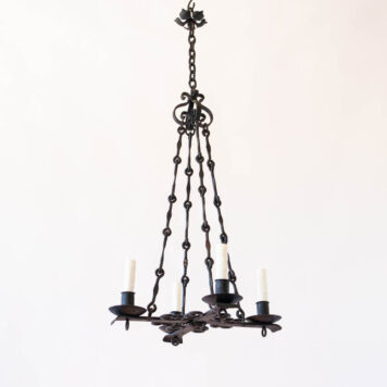 Flat iron 4 light chandelier with scrolls and hook chain
