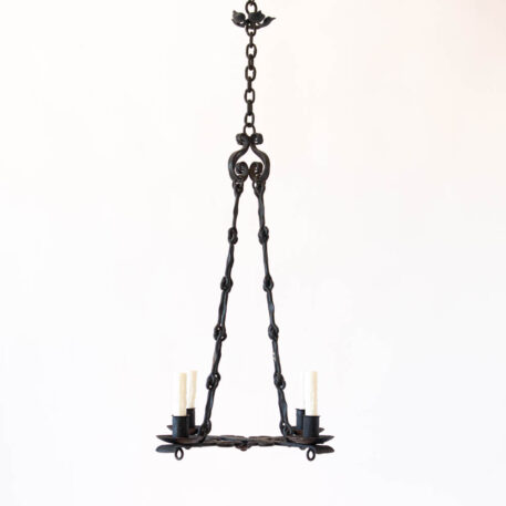 Flat iron 4 light chandelier with scrolls and hook chain and flower