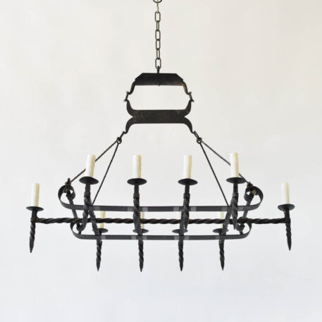 Elongated rustic iron chandelier sled design with torches straps twisted wrought iron 10 ten lights vintage large