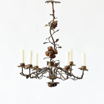 A 6 light gilded rose iron chandelier.