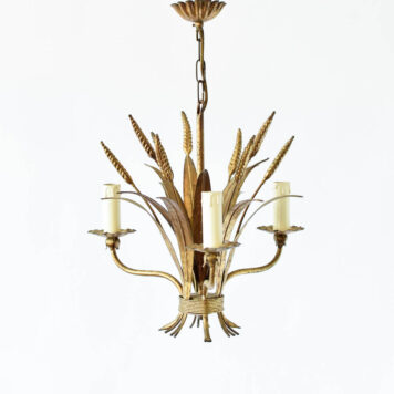 A 3 light gold leafy chandelier.